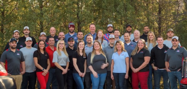 A group picture of the women and men who work for HomePro America.