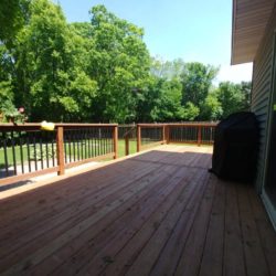Long deck with fence railing
