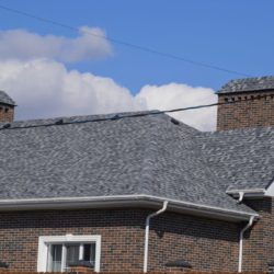 new shingle roof on brick building