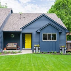 Blue suburban home with new siding